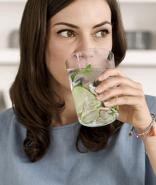 BRITA personal hydration need woman drinking water