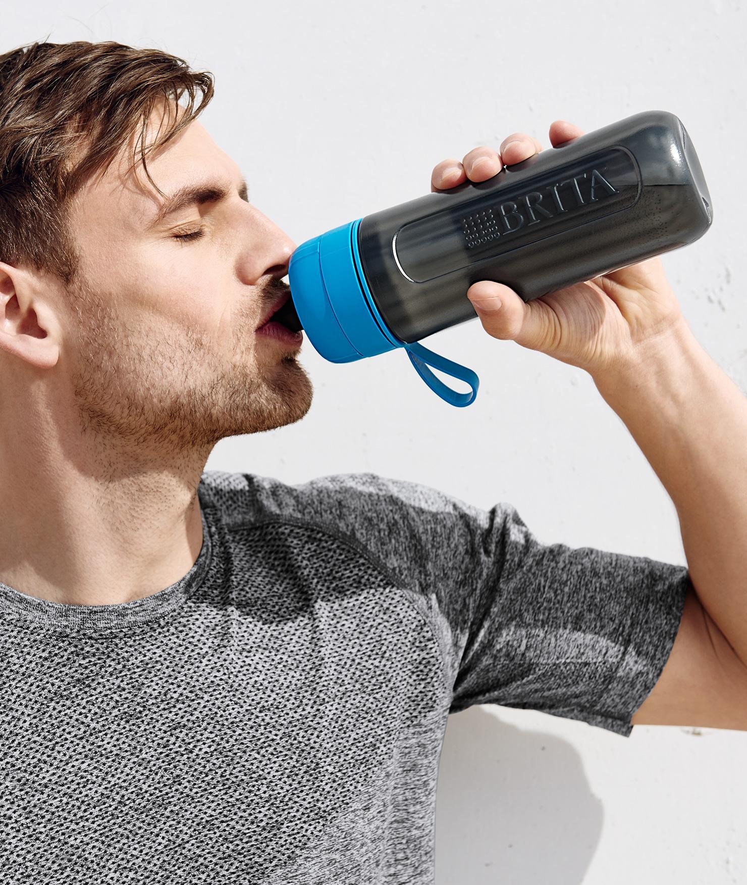 BRITA personal hydration needs man drinking water